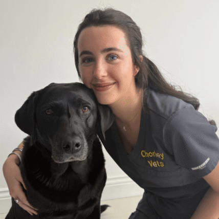 Jessica Sumner – Chorley Vets Receptionist with a black dog