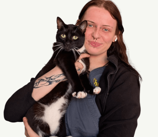 Ella-Morgan Rudd – Chorley Vets Receptionist with a black and white cat